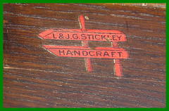 Signed with the red decal in the shape of a wooden clamp reading:  "L.&J.G. Stickley, Handcraft", circa 1906 to 1912.